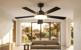 Black flush-mount ceiling fan installed in a sunlit modern living room, showing a clean home ceiling fan installation setup