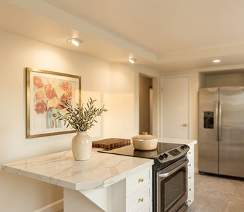 Modern kitchen with warm-glow LED recessed ceiling lights — top-rated picks for homeowners and electricians