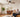 Walnut wood blade ceiling fan + warm-white LED recessed downlights in a mid-century living room — layered ceiling lighting