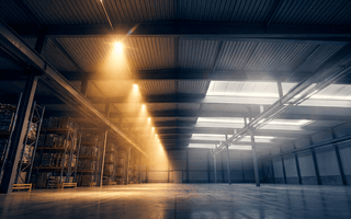 Warehouse Lighting: LED High Bay vs Wraparound Fixture Comparison - Amicolight