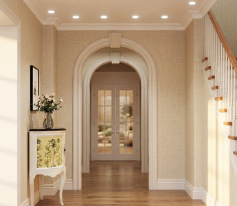 Sunlit home hallway with recessed LED ceiling lights showcasing long LED lifespan and premium residential lighting