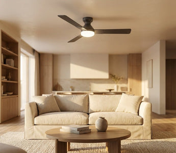 Low-profile flush mount ceiling fan with integrated LED light installed in a sunlit modern living room   with 9-foot ceiling