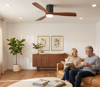 Walnut wood blade ceiling fan + warm-white LED recessed downlights in a mid-century living room — layered ceiling lighting