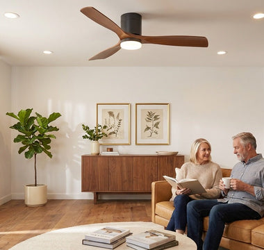 Walnut wood blade ceiling fan + warm-white LED recessed downlights in a mid-century living room — layered ceiling lighting